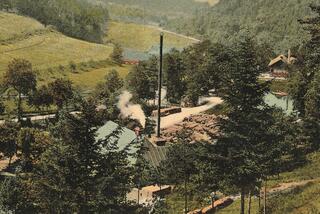 The old photo of a mill and a sawmill in the Pilské valley